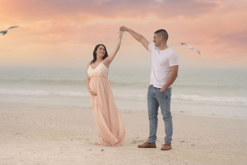 Couples portrait of a couple on the beach at sunset