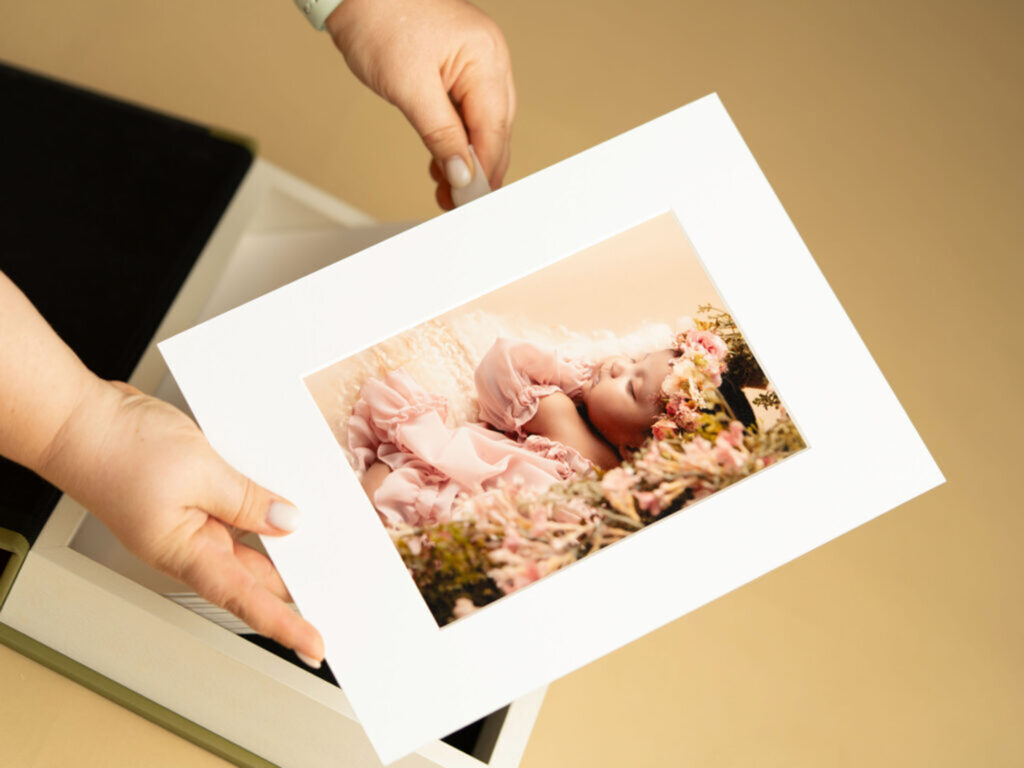 Matted print of newborn portrait